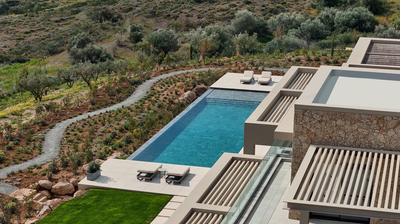 Villa and pool in golden evening light