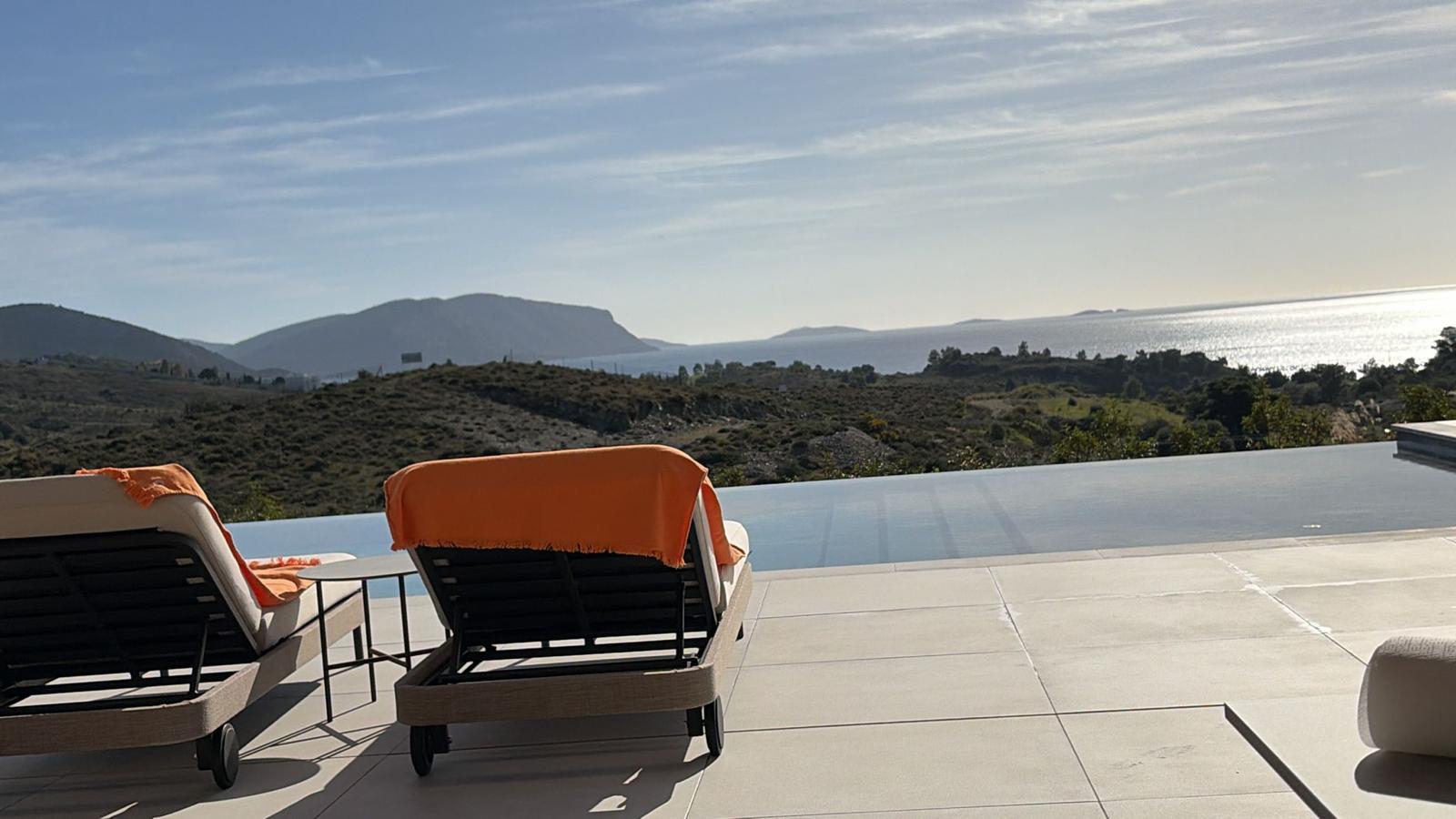 Infinity pool terrace with sea view
